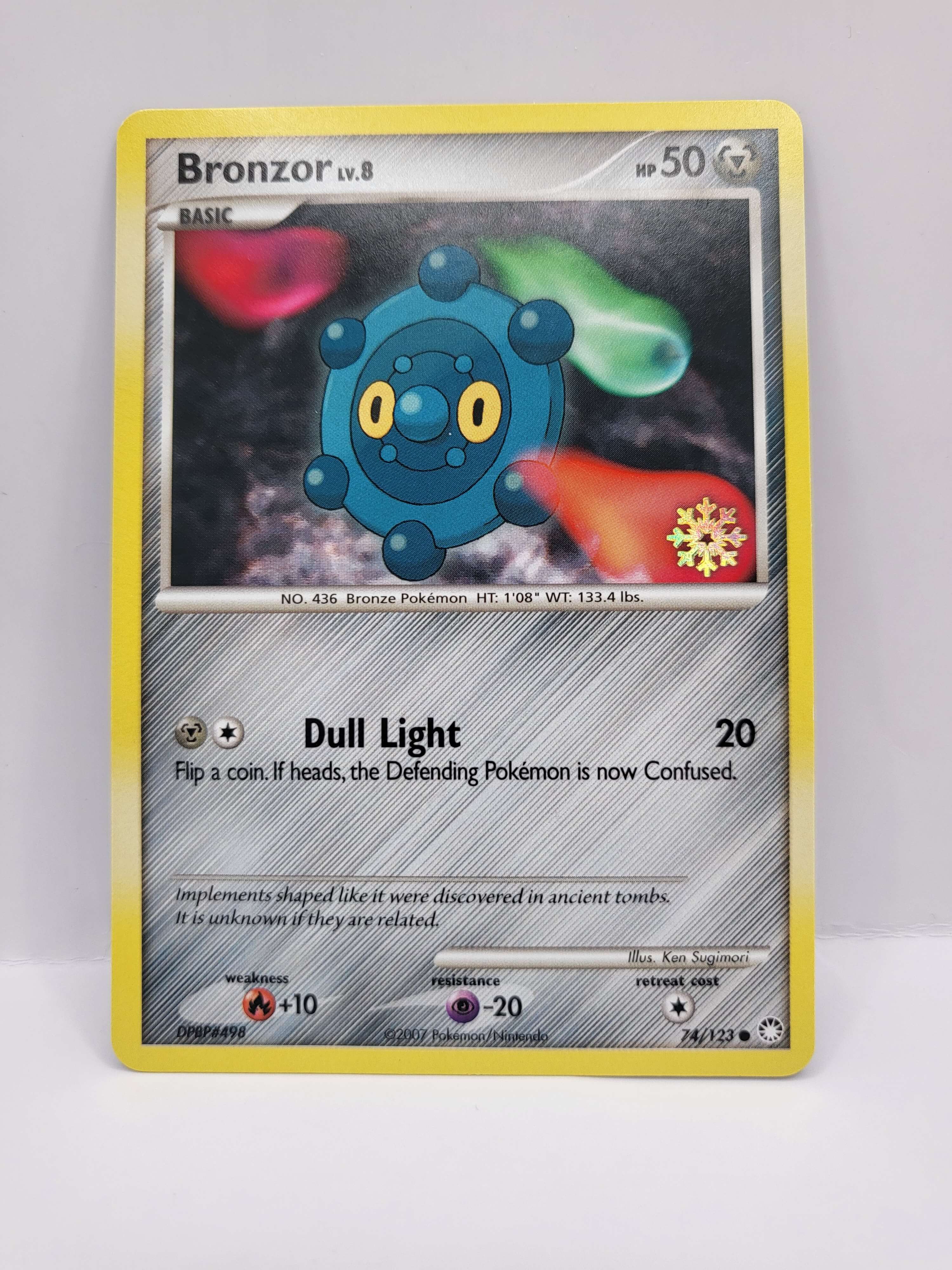 Bronzor 74/123 Card Club Bronzor 74/123 Card Club