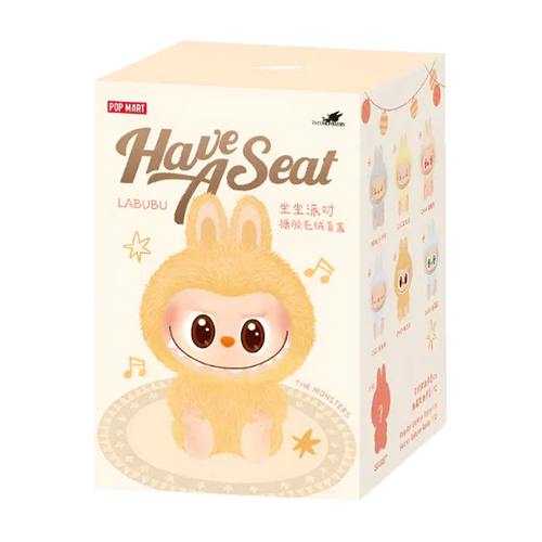 Pop Mart Labubu Have A Seat – blindboxens förpackning med gul figur på framsidan.